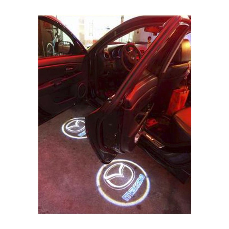 Luces de cortesia personalizadas con el logo de marca del vehicu